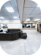 Hospital waiting room with black seating