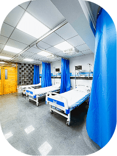 Hospital patient room with blue curtains